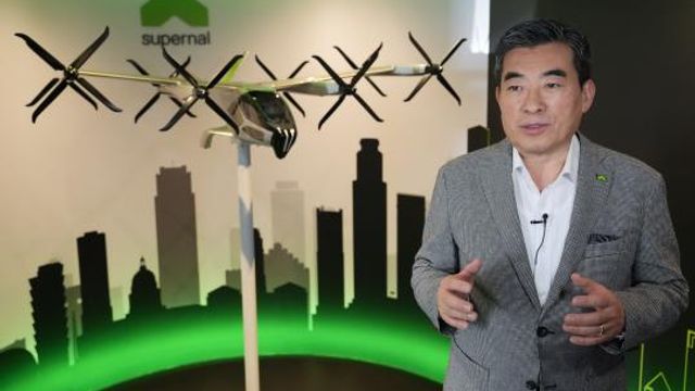 Hyundai's Supernal's CEO Shin Jaiwon speaks to The Associated Press during an interview along the Singapore Airshow in Singapore, Thursday, Feb. 22, 2024. As the aviation sector seeks ways to make air travel less polluting and more sustainable, aerospace company Embraer and South Korean automaker Hyundai are among the companies betting on a new form of air travel, air taxis. (AP Photo/Vincent Thian) Hyundai's Supernal's CEO Shin Jaiwon speaks to The Associated Press during an interview along the Singapore Airshow in Singapore, Thursday, Feb. 22, 2024. As the aviation sector seeks ways to make air travel less polluting and more sustainable, aerospace company Embraer and South Korean automaker Hyundai are among the companies betting on a new form of air travel, air taxis. (AP Photo/Vincent Thian)
