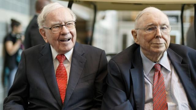 FILE- In this May 3, 2019 file photo, Berkshire Hathaway Chairman and CEO Warren Buffett, left, and Vice Chairman Charlie Munger, briefly chat with reporters before Berkshire Hathaway's annual shareholders meeting. Buffett credited his longtime partner — the late Charlie Munger — with being the architect of the Berkshire Hathaway conglomerate he’s received the credit for leading and warned shareholders in his annual letter not to listen to Wall Street pundits or financial advisors who urge them to trade often. (AP Photo/Nati Harnik, File) FILE- In this May 3, 2019 file photo, Berkshire Hathaway Chairman and CEO Warren Buffett, left, and Vice Chairman Charlie Munger, briefly chat with reporters before Berkshire Hathaway's annual shareholders meeting. Buffett credited his longtime partner — the late Charlie Munger — with being the architect of the Berkshire Hathaway conglomerate he’s received the credit for leading and warned shareholders in his annual letter not to listen to Wall Street pundits or financial advisors who urge them to trade often. (AP Photo/Nati Harnik, File)