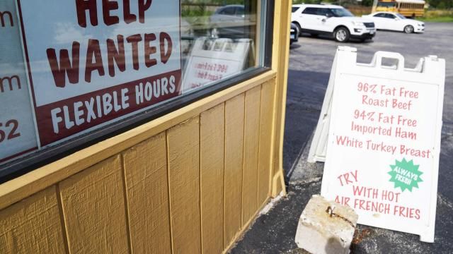 FILE - A "Help Wanted" sign is displayed in Deerfield, Ill., Wednesday, Sept. 21, 2022. The year looks to be a much better one for the U.S. economy than business economists were forecasting just a few months earlier, according to a survey released Monday, Feb. 26, 2024. (AP Photo/Nam Y. Huh) FILE - A "Help Wanted" sign is displayed in Deerfield, Ill., Wednesday, Sept. 21, 2022. The year looks to be a much better one for the U.S. economy than business economists were forecasting just a few months earlier, according to a survey released Monday, Feb. 26, 2024. (AP Photo/Nam Y. Huh)
