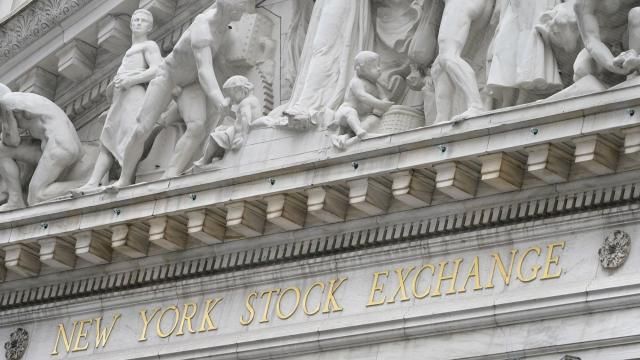 FILE - This Nov. 23, 2020 file photo shows the sign of the New York Stock Exchange in New York, Monday, Nov. 23, 2020. (AP Photo/Seth Wenig, File) FILE - This Nov. 23, 2020 file photo shows the sign of the New York Stock Exchange in New York, Monday, Nov. 23, 2020. (AP Photo/Seth Wenig, File)
