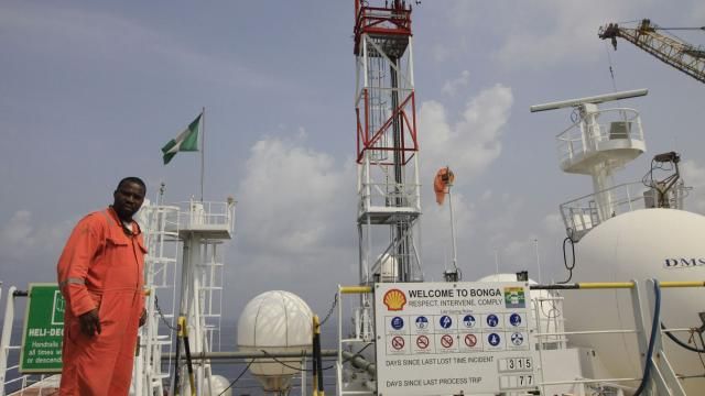 FILE - A member of Shell staff on the Bonga offshore oil Floating Production Storage and Offloading vessel off the coast of the Niger Delta in Nigeria, on Dec. 26, 2011. Local activists and international environmental groups want Nigeria's government to delay approving the sale of oil company Shell's onshore assets, claiming Shell is trying to shirk its environmental and social responsibilities in the highly polluted Niger Delta. The Centre for Research on Multinational Corporations (SOMO), a Dutch non-profit, released a report Wednesday Feb. 28, 2024 saying Shell shouldn’t be allowed to divest in the delta unless it takes “responsibility for its toxic legacy of pollution and ensures the safe decommissioning of abandoned oil infrastructure.” (AP Photo/Sunday Alamba, File) FILE - A member of Shell staff on the Bonga offshore oil Floating Production Storage and Offloading vessel off the coast of the Niger Delta in Nigeria, on Dec. 26, 2011. Local activists and international environmental groups want Nigeria's government to delay approving the sale of oil company Shell's onshore assets, claiming Shell is trying to shirk its environmental and social responsibilities in the highly polluted Niger Delta. The Centre for Research on Multinational Corporations (SOMO), a Dutch non-profit, released a report Wednesday Feb. 28, 2024 saying Shell shouldn’t be allowed to divest in the delta unless it takes “responsibility for its toxic legacy of pollution and ensures the safe decommissioning of abandoned oil infrastructure.” (AP Photo/Sunday Alamba, File)