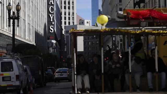 A cable car traveling along Powell Street passes Macy's near Union Square in San Francisco on Tuesday, Feb. 27, 2024. Macy's will close 150 unproductive namesake stores over the next three years, including 50 by year-end, the department store operator said Tuesday after posting a fourth-quarter loss and declining sales. (Benjamin Fanjoy/San Francisco Chronicle via AP)
