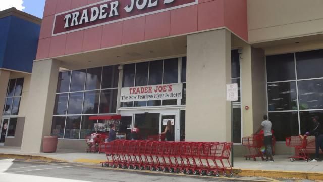 FILE - People stand in line waiting to enter Trader Joe's to buy groceries in Pembroke Pines, Fla., on March 24, 2020. More than 61,000 pounds of steamed chicken soup dumplings sold at Trader Joe's are being recalled for possibly containing hard plastic, U.S. regulators announced Saturday, March 2, 2024. (AP Photo/Brynn Anderson, File) FILE - People stand in line waiting to enter Trader Joe's to buy groceries in Pembroke Pines, Fla., on March 24, 2020. More than 61,000 pounds of steamed chicken soup dumplings sold at Trader Joe's are being recalled for possibly containing hard plastic, U.S. regulators announced Saturday, March 2, 2024. (AP Photo/Brynn Anderson, File)