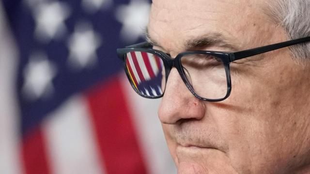 FILE - An American flag is seen in Federal Reserve Board Chair Jerome Powell's glasses as he speaks at a news conference at the Federal Reserve, Dec. 13, 2023, in Washington. On Wednesday, March 6, 2024, Powell testifies to the House Financial Services Committee on the first of two days of semi-annual testimony to Congress. (AP Photo/Alex Brandon, File) FILE - An American flag is seen in Federal Reserve Board Chair Jerome Powell's glasses as he speaks at a news conference at the Federal Reserve, Dec. 13, 2023, in Washington. On Wednesday, March 6, 2024, Powell testifies to the House Financial Services Committee on the first of two days of semi-annual testimony to Congress. (AP Photo/Alex Brandon, File)