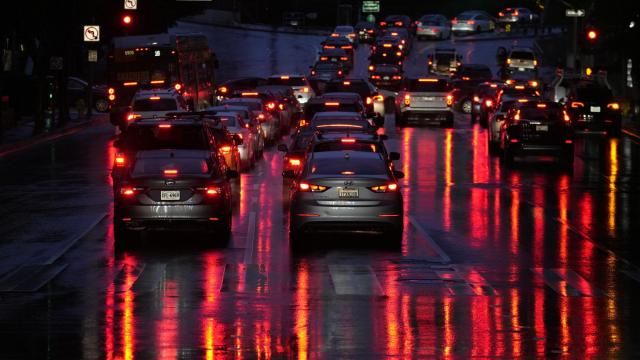 FILE - Car lights are reflected in the wet street as commuters line up in traffic to enter the I-110 Harbor freeway in the rain in downtown Los Angeles, March 6, 2024. Most electronic systems that take on some driving tasks for humans don’t adequately make sure drivers are paying attention, and they don’t issue strong enough warnings to make drivers behave. That's according to an insurance industry study published Tuesday, March 12, 2024. (AP Photo/Damian Dovarganes, File) FILE - Car lights are reflected in the wet street as commuters line up in traffic to enter the I-110 Harbor freeway in the rain in downtown Los Angeles, March 6, 2024. Most electronic systems that take on some driving tasks for humans don’t adequately make sure drivers are paying attention, and they don’t issue strong enough warnings to make drivers behave. That's according to an insurance industry study published Tuesday, March 12, 2024. (AP Photo/Damian Dovarganes, File)