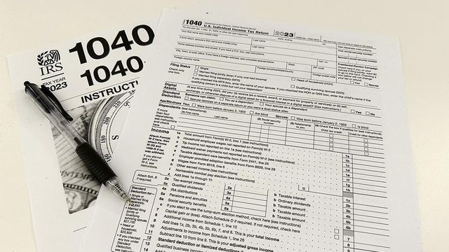 FILE - An Internal Revenue Service 2023 1040 tax form and instructions are shown on Jan. 26, 2024 in New York. It's tax season in the U.S., and for many people, filing tax returns can be a daunting task that's often left until the last minute. (AP Photo/Peter Morgan, File) FILE - An Internal Revenue Service 2023 1040 tax form and instructions are shown on Jan. 26, 2024 in New York. It's tax season in the U.S., and for many people, filing tax returns can be a daunting task that's often left until the last minute. (AP Photo/Peter Morgan, File)