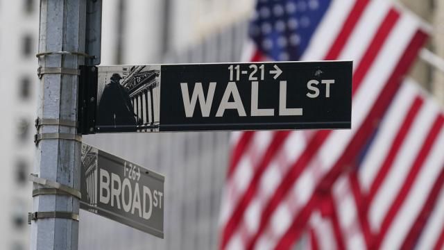 FILE - A street sign is seen in front of the New York Stock Exchange in New York, Tuesday, June 14, 2022. AP Photo/Seth Wenig, File) FILE - A street sign is seen in front of the New York Stock Exchange in New York, Tuesday, June 14, 2022. AP Photo/Seth Wenig, File)