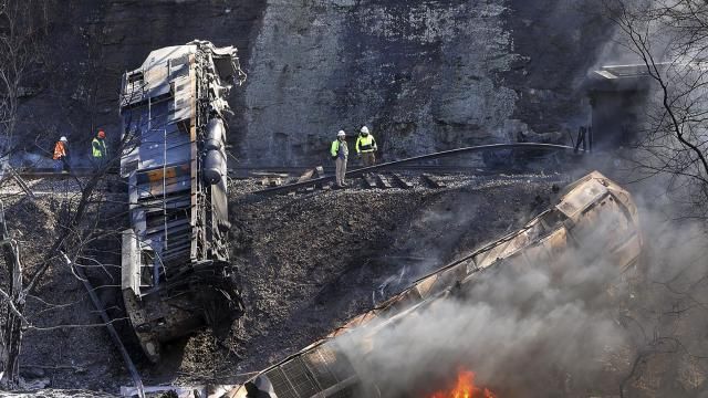 Smoke fills the sky after an empty CSX coal train hit a rockslide along tracks causing a fiery derailment, March 8, 2023, in a remote area just south of Sandstone, W.Va. Transportation Secretary Pete Buttigieg has reiterated his concerns about railroad safety and scolded the industry for not doing more to improve since last year's fiery Ohio derailment. (Jenny Harnish/The Register-Herald via AP, file) Smoke fills the sky after an empty CSX coal train hit a rockslide along tracks causing a fiery derailment, March 8, 2023, in a remote area just south of Sandstone, W.Va. Transportation Secretary Pete Buttigieg has reiterated his concerns about railroad safety and scolded the industry for not doing more to improve since last year's fiery Ohio derailment. (Jenny Harnish/The Register-Herald via AP, file)