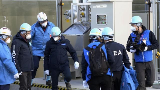 International Atomic Energy Agency Director General Rafael Mariano Grossi, center, visits a facility for sampling treated and diluted radioactive water at the Fukushima Daiichi nuclear power plant, operated by Tokyo Electric Power Company Holdings (TEPCO), in Futaba town, northeastern Japan, Wednesday, March 13, 2024. (AP Photo/Eugene Hoshiko, Pool) International Atomic Energy Agency Director General Rafael Mariano Grossi, center, visits a facility for sampling treated and diluted radioactive water at the Fukushima Daiichi nuclear power plant, operated by Tokyo Electric Power Company Holdings (TEPCO), in Futaba town, northeastern Japan, Wednesday, March 13, 2024. (AP Photo/Eugene Hoshiko, Pool)
