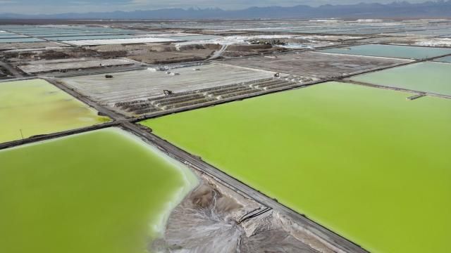 Brine evaporates in pools at the lithium extraction plant facilities of the SQM Lithium company near Peine, Chile, Tuesday, April 18, 2023. In the “lithium triangle” – a region spanning Argentina, Chile and Bolivia – native communities sit upon a treasure trove of the stuff: an estimated trillion dollars in lithium. (AP Photo/Rodrigo Abd) Brine evaporates in pools at the lithium extraction plant facilities of the SQM Lithium company near Peine, Chile, Tuesday, April 18, 2023. In the “lithium triangle” – a region spanning Argentina, Chile and Bolivia – native communities sit upon a treasure trove of the stuff: an estimated trillion dollars in lithium. (AP Photo/Rodrigo Abd)