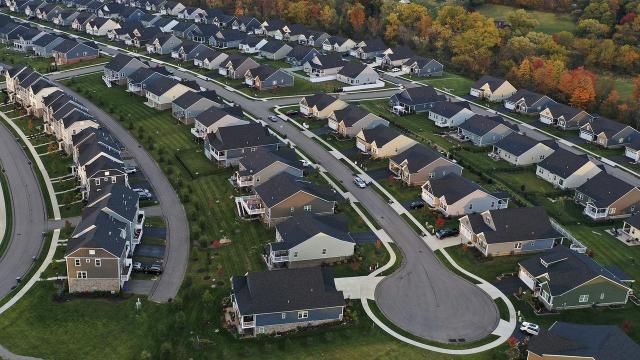 FILE - A new housing development is seen from above, Oct. 12, 2022, in Middlesex Township, Pa. Real estate brokerage company Compass Inc. will pay $57.5 million as part of a proposed settlement to resolve lawsuits over real estate commissions, the company said in a regulatory filing Friday, March 22, 2024. (AP Photo/Gene J. Puskar, File) FILE - A new housing development is seen from above, Oct. 12, 2022, in Middlesex Township, Pa. Real estate brokerage company Compass Inc. will pay $57.5 million as part of a proposed settlement to resolve lawsuits over real estate commissions, the company said in a regulatory filing Friday, March 22, 2024. (AP Photo/Gene J. Puskar, File)