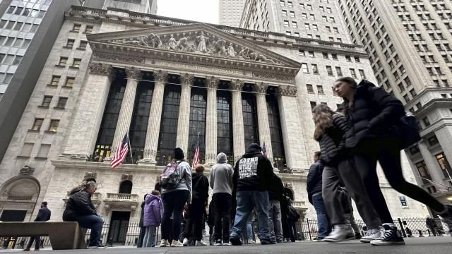 People walk past the New York Stock Exchange Wednesday, March 27, 2024. World shares are mixed after Wall Street slipped a bit further from its record highs. (AP Photo/Peter Morgan) People walk past the New York Stock Exchange Wednesday, March 27, 2024. World shares are mixed after Wall Street slipped a bit further from its record highs. (AP Photo/Peter Morgan)