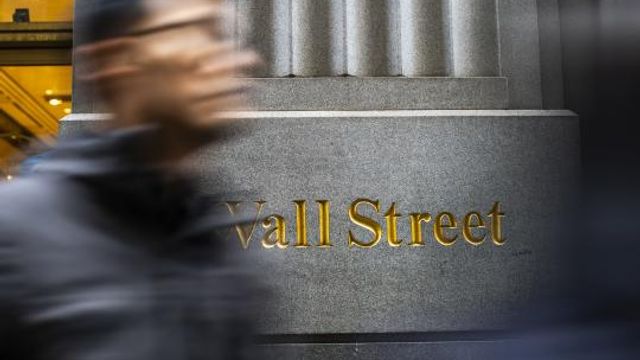 FILE - People walk by the New York Stock Exchange in New York, Tuesday, March 19, 2024. (AP Photo/Eduardo Munoz Alvarez, File) FILE - People walk by the New York Stock Exchange in New York, Tuesday, March 19, 2024. (AP Photo/Eduardo Munoz Alvarez, File)