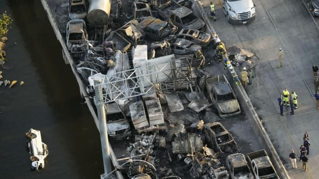 FILE - In this aerial photo, responders are seen near wreckage in the aftermath of a fatal, multi-vehicle pileup on I-55 in Manchac, La., Oct. 23, 2023. The National HIghway Traffic Safety Administration will release its estimate of traffic deaths for 2023 on Monday, April 1, 2024. (AP Photo/Gerald Herbert, File) FILE - In this aerial photo, responders are seen near wreckage in the aftermath of a fatal, multi-vehicle pileup on I-55 in Manchac, La., Oct. 23, 2023. The National HIghway Traffic Safety Administration will release its estimate of traffic deaths for 2023 on Monday, April 1, 2024. (AP Photo/Gerald Herbert, File)