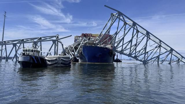 The fallen Francis Scott Key Bridge in Baltimore is pictured Sunday, March 31, 2024, where divers assisted crews with the complicated and meticulous operation of removing steel and concrete. (AP Photos/Mike Pesoli) The fallen Francis Scott Key Bridge in Baltimore is pictured Sunday, March 31, 2024, where divers assisted crews with the complicated and meticulous operation of removing steel and concrete. (AP Photos/Mike Pesoli)