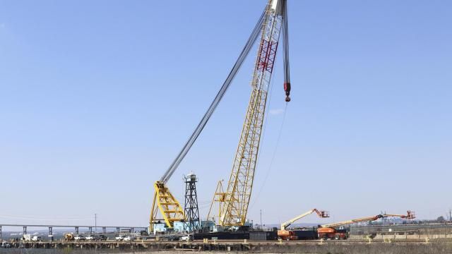 FILE - The Chesapeake 1000 crane, which will be used to help remove wreckage from the collapse of the Key Bridge, is docked at Tradepoint Atlantic in Sparrows Point, Md., March 29, 2024. The floating crane that’s been hauling away shattered steel from the collapsed Baltimore bridge played a much different role during the Cold War. (AP Photo/Brian Witte, File) FILE - The Chesapeake 1000 crane, which will be used to help remove wreckage from the collapse of the Key Bridge, is docked at Tradepoint Atlantic in Sparrows Point, Md., March 29, 2024. The floating crane that’s been hauling away shattered steel from the collapsed Baltimore bridge played a much different role during the Cold War. (AP Photo/Brian Witte, File)