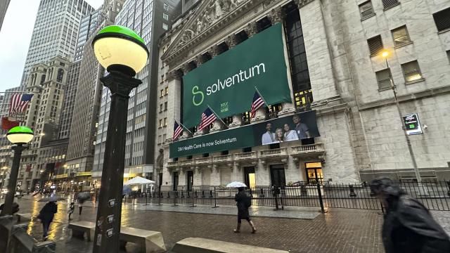 People walk past the New York Stock Exchange Wednesday, April 3, 2024 in New York. Healthcare business Solventum started trading at the NYSE on Wednesday. (AP Photo/Peter Morgan) People walk past the New York Stock Exchange Wednesday, April 3, 2024 in New York. Healthcare business Solventum started trading at the NYSE on Wednesday. (AP Photo/Peter Morgan)