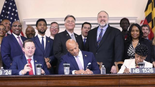 Maryland Gov. Wes Moore signs legislation on Tuesday, April 9, 2024 in Annapolis, Md., to help employees of the Port of Baltimore affected by the Francis Scott Key Bridge collapse. It authorizes use of the state's rainy day fund to provide financial help. (AP Photo/Brian Witte) Maryland Gov. Wes Moore signs legislation on Tuesday, April 9, 2024 in Annapolis, Md., to help employees of the Port of Baltimore affected by the Francis Scott Key Bridge collapse. It authorizes use of the state's rainy day fund to provide financial help. (AP Photo/Brian Witte)