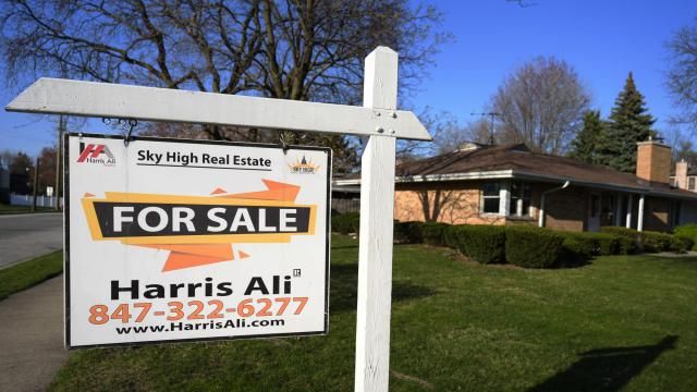 A "For Sale" sign is displayed in front of a home in Skokie, Ill., Sunday, April 14, 2024. On Thursday, May 2, 2024, Freddie Mac reports on this week's average U.S. mortgage rates. (AP Photo/Nam Y. Huh)
