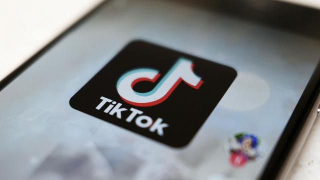 FILE - The TikTok logo is displayed on a smartphone screen in Tokyo on Sept. 28, 2020. TikTok says it's going to start automatically labeling content that's made by artificial intelligence when it's uploaded from certain platforms. TikTok says its efforts are an attempt to combat misinformation from being spread on its social media platform. The announcement came on ABC's “Good Morning America” on Thursday, May 9, 2024. (AP Photo/Kiichiro Sato, File)