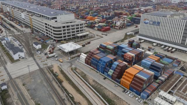 FILE - Shipping containers are seen ready for transport at the Guangzhou Port in the Nansha district in southern China's Guangdong province on April 17, 2025. (AP Photo/Ng Han Guan, File)