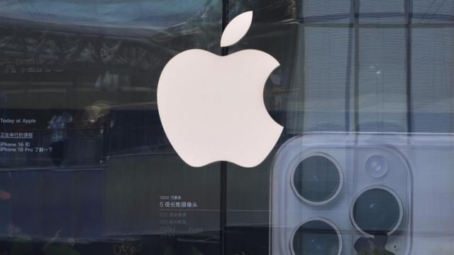 People visit an Apple store promoting its iPhone 16 at an outdoor shopping mall in Beijing, Sunday, May 11, 2025. (AP Photo/Andy Wong)