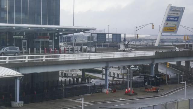 FILE - A vehicle stops at Terminal 1 at John F. Kennedy International Airport in New York, Feb. 17, 2023. (AP Photo/Seth Wenig, File)