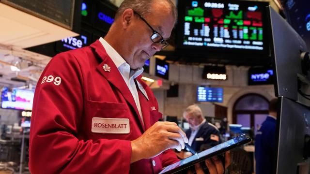 Trader William Lawrence works on the floor of the New York Stock Exchange, Tuesday, July 29, 2025. (AP Photo/Richard Drew)