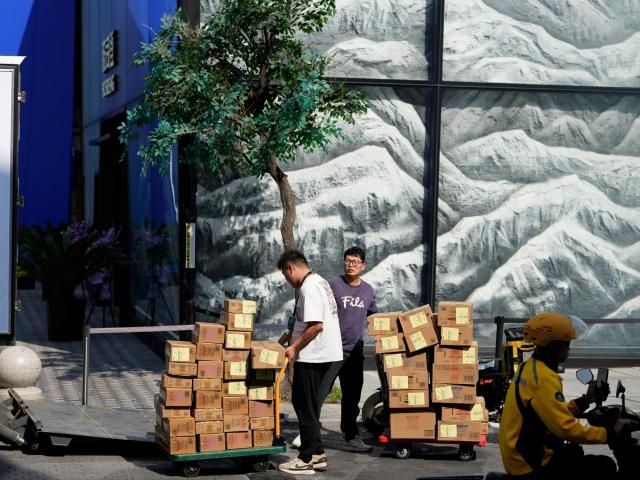 China's economy slows to 4.8% annual growth in July-September, hit by tariffs and slack demand