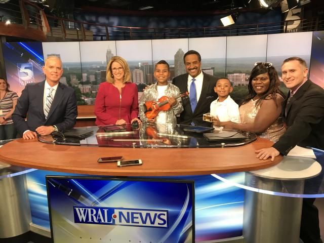 Tyler Butler-Figueroa poses with the WRAL Evening News