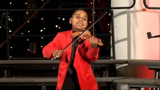 Tyler Butler-Figueroa performs during ATC Tower Lighting ceremony