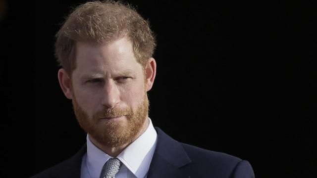 FILE - Britain's Prince Harry arrives in the gardens of Buckingham Palace in London, Jan. 16, 2020. Prince Harry has reached an out-of-court settlement with a tabloid newspaper publisher that invaded his privacy with phone hacking and other illegal snooping. Attorney David Sherborne said Friday that Mirror Group Newspapers had agreed to pay Harry’ “substantial” costs and damages and would make an interim payment of 400,000 pounds or $505,000. (AP Photo/Kirsty Wigglesworth, File) FILE - Britain's Prince Harry arrives in the gardens of Buckingham Palace in London, Jan. 16, 2020. Prince Harry has reached an out-of-court settlement with a tabloid newspaper publisher that invaded his privacy with phone hacking and other illegal snooping. Attorney David Sherborne said Friday that Mirror Group Newspapers had agreed to pay Harry’ “substantial” costs and damages and would make an interim payment of 400,000 pounds or $505,000. (AP Photo/Kirsty Wigglesworth, File)