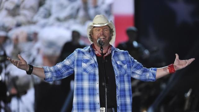 FILE - Toby Keith performs at ACM Presents an All-Star Salute to the Troops on April 7, 2024, in Las Vegas. Keith, who died on Monday, Feb. 5, 2024, of cancer at age 62, is being celebrated for his immense catalog of songs. But his 2002 track “Courtesy Of The Red, White And Blue (The Angry American)" may be remembered most. (Photo by Chris Pizzello/Invision/AP, File) FILE - Toby Keith performs at ACM Presents an All-Star Salute to the Troops on April 7, 2024, in Las Vegas. Keith, who died on Monday, Feb. 5, 2024, of cancer at age 62, is being celebrated for his immense catalog of songs. But his 2002 track “Courtesy Of The Red, White And Blue (The Angry American)" may be remembered most. (Photo by Chris Pizzello/Invision/AP, File)