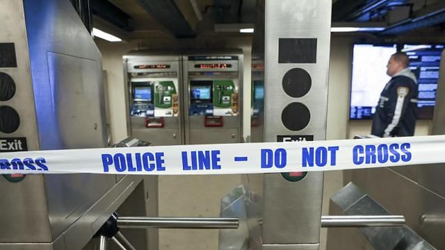 New York Police walk through the Mount Eden subway station while investigating a shooting, Monday, Feb. 12, 2024, in the Bronx borough of New York. Several people were shot Monday at the New York City subway station, police said. (New York Police Department via AP) New York Police walk through the Mount Eden subway station while investigating a shooting, Monday, Feb. 12, 2024, in the Bronx borough of New York. Several people were shot Monday at the New York City subway station, police said. (New York Police Department via AP)