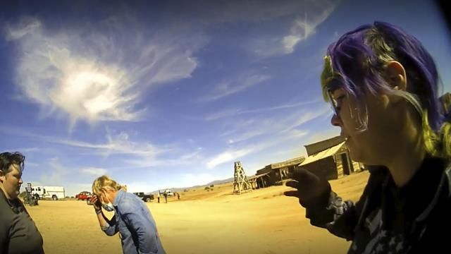 In this screen grab from lapel camera video provided by the Santa Fe County Sheriff's Office, movie set armorer Hannah Gutierrez-Reed, right, speaks with a sheriff's deputy as other colleagues, at center and left, react on the set of the western move "Rust," shortly after the fatal shooting of cinematographer Halyna Hutchins by Alec Baldwin during a rehearsal, Oct. 21, 2021, in New Mexico. The scheduled trial next week of the movie weapons supervisor in the fatal shooting of a cinematographer by Alec Baldwin may hinge on an enduring mystery: How did live ammunition find its way onto the set of a film set where it was expressly prohibited? (Santa Fe County Sheriff's Office via AP) In this screen grab from lapel camera video provided by the Santa Fe County Sheriff's Office, movie set armorer Hannah Gutierrez-Reed, right, speaks with a sheriff's deputy as other colleagues, at center and left, react on the set of the western move "Rust," shortly after the fatal shooting of cinematographer Halyna Hutchins by Alec Baldwin during a rehearsal, Oct. 21, 2021, in New Mexico. The scheduled trial next week of the movie weapons supervisor in the fatal shooting of a cinematographer by Alec Baldwin may hinge on an enduring mystery: How did live ammunition find its way onto the set of a film set where it was expressly prohibited? (Santa Fe County Sheriff's Office via AP)
