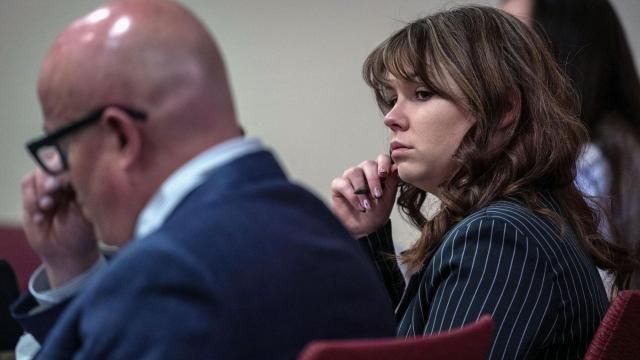 Hannah Gutierrez-Reed, center, sits with her attorney Jason Bowles, left, during testimony in the trial against her in First District Court, in Santa Fe, N.M., Friday, March, 1, 2024. Gutierrez-Reed was working as the armorer on the movie "Rust" when actor Alec Baldwin fatally shot cinematographer Halyna Hutchins and wounded Souza. Gutierrez-Reed is fighting involuntary manslaughter and tampering with evidence charges.(Eddie Moore/The Albuquerque Journal via AP, Pool)