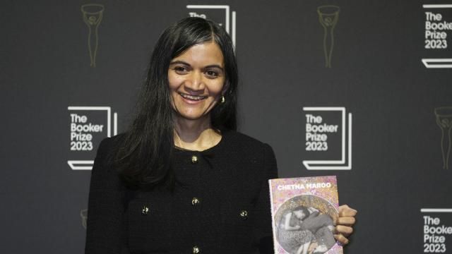FILE - British author Chetna Maroo poses with her book "Western Lane" during a photocall with the six shortlisted authors for the Booker Prize 2023, in London, Thursday, Nov. 23, 2023 ahead of the award ceremony on Nov. 26 in London. Novels that give voice to the often unheard stories of migrants around the world are among the nominees for the 2024 Women’s Prize for Fiction on Tuesday, March 5, 2024. One of the debut novelists, British author Chetna Maroo, was a finalist for the 2023 Booker Prize with “Western Lane,” the story of a squash prodigy grappling with family tragedy. (AP Photo/Kin Cheung, File) FILE - British author Chetna Maroo poses with her book "Western Lane" during a photocall with the six shortlisted authors for the Booker Prize 2023, in London, Thursday, Nov. 23, 2023 ahead of the award ceremony on Nov. 26 in London. Novels that give voice to the often unheard stories of migrants around the world are among the nominees for the 2024 Women’s Prize for Fiction on Tuesday, March 5, 2024. One of the debut novelists, British author Chetna Maroo, was a finalist for the 2023 Booker Prize with “Western Lane,” the story of a squash prodigy grappling with family tragedy. (AP Photo/Kin Cheung, File)