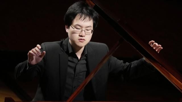 Canadian pianist Eric Guo plays Frederic Chopin's Concerto in F minor on a replica of a 1830 Pleyel piano during a concert marking the 19th century piano virutoso and composer's 214th birthday, in Warsaw, Poland, on Friday, March 1, 2024. Guo won a quintannual competition to play Chopin on period instruments organized by the Fryderyk Chopin Institute. (AP Photo/Czarek Sokolowski) Canadian pianist Eric Guo plays Frederic Chopin's Concerto in F minor on a replica of a 1830 Pleyel piano during a concert marking the 19th century piano virutoso and composer's 214th birthday, in Warsaw, Poland, on Friday, March 1, 2024. Guo won a quintannual competition to play Chopin on period instruments organized by the Fryderyk Chopin Institute. (AP Photo/Czarek Sokolowski)