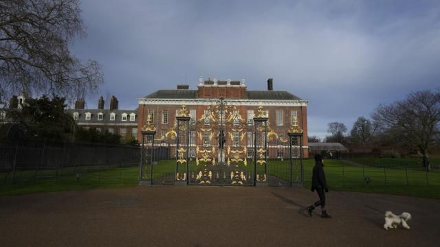 FILE - A dog walker passes Kensington Palace in London, Friday, Jan. 6, 2023. The first official photo of Kate, the Princess of Wales, since she underwent abdominal surgery nearly two months earlier, was pulled from circulation by The Associated Press and several other news organizations, Sunday, March 10, 2024, because the image appeared to have been manipulated. (AP Photo/Kirsty Wigglesworth, File) FILE - A dog walker passes Kensington Palace in London, Friday, Jan. 6, 2023. The first official photo of Kate, the Princess of Wales, since she underwent abdominal surgery nearly two months earlier, was pulled from circulation by The Associated Press and several other news organizations, Sunday, March 10, 2024, because the image appeared to have been manipulated. (AP Photo/Kirsty Wigglesworth, File)