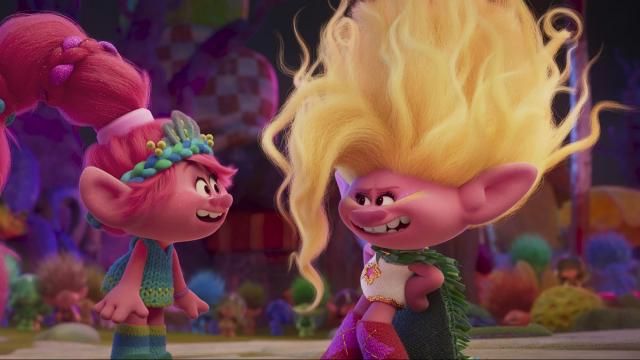 This image released by DreamWorks Animation shows the characters Queen Poppy voiced by Anna Kendrick, left, and Viva voiced by Camila Cabello, in a scene of the animated film "Trolls Band Together." (DreamWorks Animation via AP) This image released by DreamWorks Animation shows the characters Queen Poppy voiced by Anna Kendrick, left, and Viva voiced by Camila Cabello, in a scene of the animated film "Trolls Band Together." (DreamWorks Animation via AP)