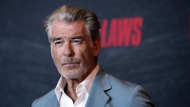 FILE - Pierce Brosnan, a cast member in "The Out-Laws," poses at a special screening of the film, June 26, 2023, at the Regal LA Live theaters in Los Angeles. Brosnan, whose fictitious movie character James Bond has been in hot water plenty of times, pleaded guilty Thursday, March 14, 2024, to stepping out of bounds in a thermal area during a November 2023 visit to Yellowstone National Park. (AP Photo/Chris Pizzello, File)
