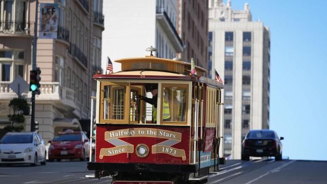 A cable car dedicated to Tony Bennett makes its way up California Street to Nob Hill in San Francisco, Thursday, March 14, 2024. Tony Bennett loved San Francisco and its cable cars and in return, the city has dedicated one of those cable cars to the famous crooner who died in July. Cable car 53, built in 1907, has several plaques and painted gold ribbons remembering Bennett. (AP Photo/Eric Risberg) A cable car dedicated to Tony Bennett makes its way up California Street to Nob Hill in San Francisco, Thursday, March 14, 2024. Tony Bennett loved San Francisco and its cable cars and in return, the city has dedicated one of those cable cars to the famous crooner who died in July. Cable car 53, built in 1907, has several plaques and painted gold ribbons remembering Bennett. (AP Photo/Eric Risberg)