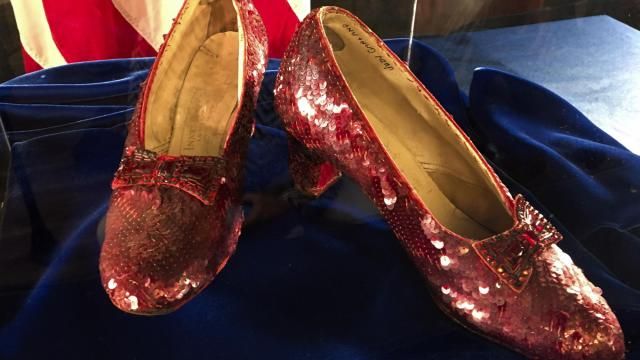 FILE - Ruby slippers once worn by Judy Garland in the "The Wizard of Oz," are displayed at a news conference, Sept. 4, 2018, at the FBI office in Brooklyn Center, Minn. A second man has been charged in connection with the 2005 theft of a pair of the ruby slippers, according to an indictment unsealed Sunday, March 17, 2024. (AP Photo/Jeff Baenen, File) FILE - Ruby slippers once worn by Judy Garland in the "The Wizard of Oz," are displayed at a news conference, Sept. 4, 2018, at the FBI office in Brooklyn Center, Minn. A second man has been charged in connection with the 2005 theft of a pair of the ruby slippers, according to an indictment unsealed Sunday, March 17, 2024. (AP Photo/Jeff Baenen, File)