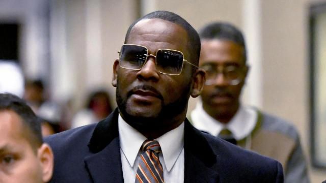 FILE - R. Kelly leaves the Daley Center after a hearing in his child support case, May 8, 2019, in Chicago. R. Kelly’s lawyer told an appeals court Monday, March 18, 2024, that all kinds of legitimate organizations — even college fraternities — could be deemed racketeering organizations under a law unjustly used to convict the R&B superstar at his Brooklyn trial of sexually abusing young fans, including some who were children, for decades. (AP Photo/Matt Marton, File) FILE - R. Kelly leaves the Daley Center after a hearing in his child support case, May 8, 2019, in Chicago. R. Kelly’s lawyer told an appeals court Monday, March 18, 2024, that all kinds of legitimate organizations — even college fraternities — could be deemed racketeering organizations under a law unjustly used to convict the R&B superstar at his Brooklyn trial of sexually abusing young fans, including some who were children, for decades. (AP Photo/Matt Marton, File)