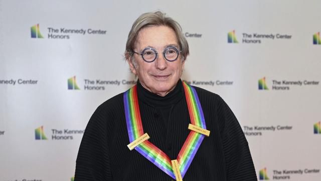 FILE - Conductor Michael Tilson Thomas arrives at the State Department for the Kennedy Center Honors gala dinner, Saturday, Dec. 3, 2022, in Washington. Tilson Thomas, an honoree in 2019, is to conduct the opening subscription program of the New York Philharmonic season. (AP Photo/Kevin Wolf, File) FILE - Conductor Michael Tilson Thomas arrives at the State Department for the Kennedy Center Honors gala dinner, Saturday, Dec. 3, 2022, in Washington. Tilson Thomas, an honoree in 2019, is to conduct the opening subscription program of the New York Philharmonic season. (AP Photo/Kevin Wolf, File)