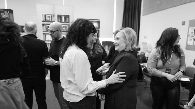 This photo provided by Rubenstein shows Director Leigh Silverman talking with former Secretary of State Hillary Rodham Clinton during a rehearsal for the off-Broadway musical “Suffs” in New York. Clinton and Shaina Taub are joining together as producers of the musical about the suffragist movement. (Jenny Anderson via AP) This photo provided by Rubenstein shows Director Leigh Silverman talking with former Secretary of State Hillary Rodham Clinton during a rehearsal for the off-Broadway musical “Suffs” in New York. Clinton and Shaina Taub are joining together as producers of the musical about the suffragist movement. (Jenny Anderson via AP)