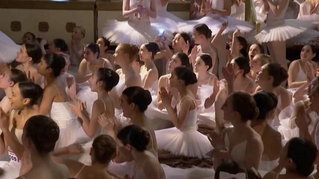 This image taken from video shows dozens of young dancers waiting to hear if they have broken a world record for dancing on pointe in one place in the Plaza Hotel, Wednesday, April 17, 2024, in New York. The spectacle was organized by Youth America Grand Prix, a ballet scholarship program that is celebrating its 25th anniversary with three nights of performances at the Lincoln Center for the Performing Arts. (AP Photo)