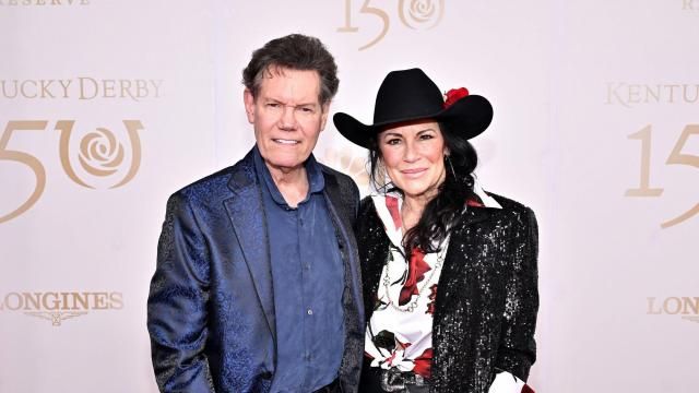 **This image is for use with this specific article only** Randy Travis and Mary Davis attend the Kentucky Derby 150 at Churchill Downs on May 4 in Louisville, Kentucky. Mandatory Credit: Daniel Boczarski/Getty Images for Churchill Downs via CNN Newsource.