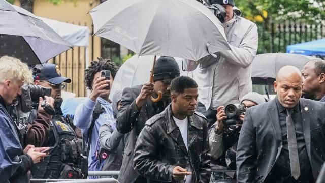 Rapper Kid Cudi, center, arrives at Federal Court for the trial of Sean "Diddy" Combs, in New York, Thursday, May 22, 2025. (AP Photo/Richard Drew)