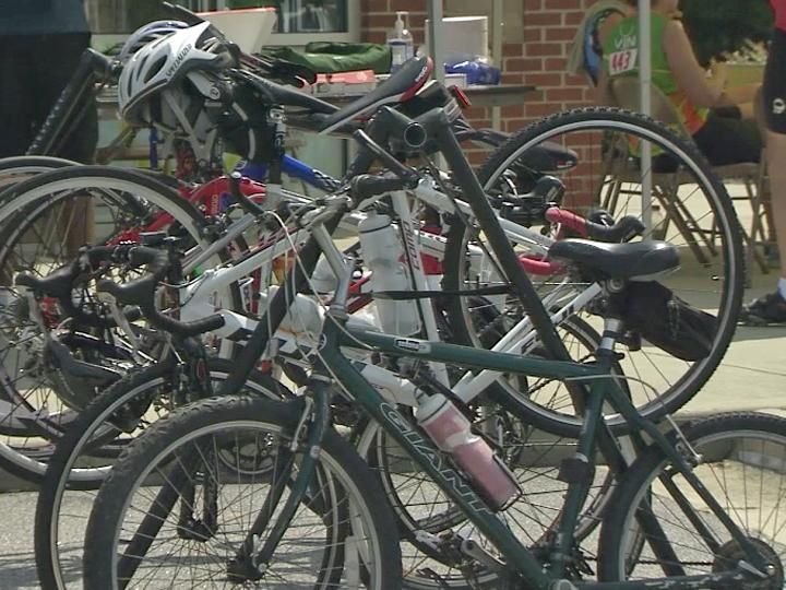 Bicyclists take to streets for silent ride, bring attention to spike in ...